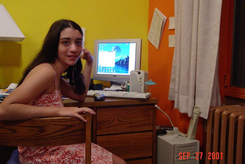 Kayte and desk in Caltech dorm room.JPG